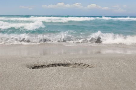 footprint on sand beachの写真素材