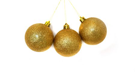 three xmas balls over whiteの写真素材