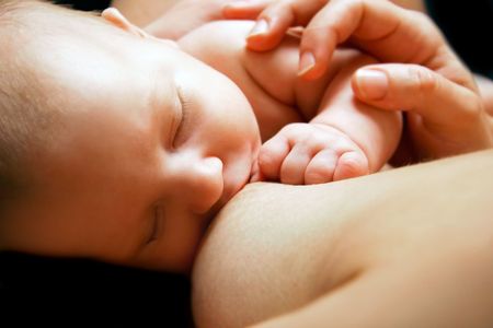 close up of newborn baby near breastの写真素材