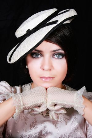 beautiful girl in retro styled over blackの写真素材