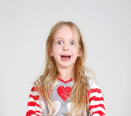 funny girl with widely-open eyesの写真素材