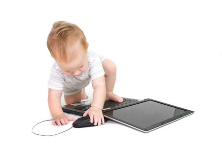 baby with laptop over whiteの写真素材