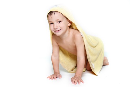cute boy in towel after bathの写真素材