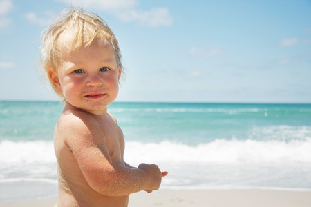 cute toddler on sea backgroundの写真素材