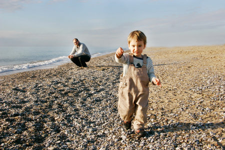 father and son on beach