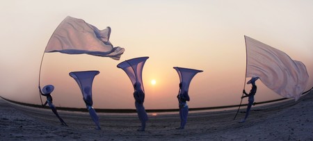 group of cyborgs with flags outdoorsの写真素材