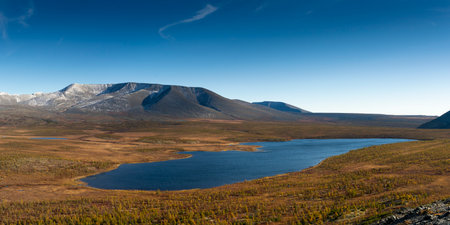Far East of Russia, Magadan region, Susumansky district, lake Malyk. Surroundings of the mountain lake Malyk in the north of the Far East is located five hundred kilometers from the city of Magadan.の写真素材