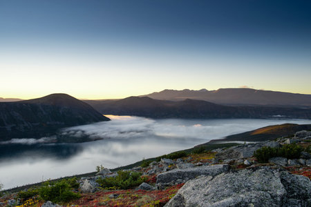 Far East of Russia, Magadan region, Susumansky district, lake Malyk. Surroundings of the mountain lake Malyk in the north of the Far East is located five hundred kilometers from the city of Magadan.の写真素材