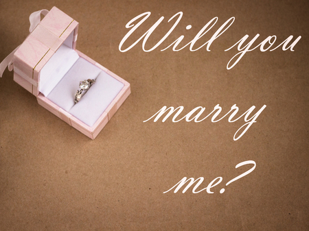 silver wedding, engagement ring with diamond, will you marry me textの写真素材
