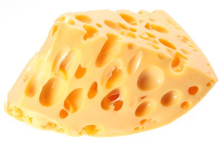 Piece of Swiss cheese on a white background.の写真素材