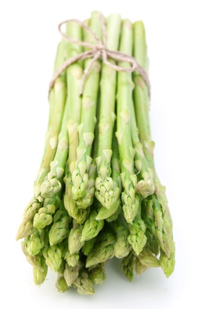 Sheaf of asparagus on a white background.の写真素材