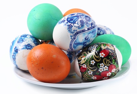 Multi-colored eggs on a plate. Easter holidayの写真素材