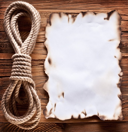 Image of old paper on wood background.の写真素材