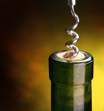 Close the bottle with the corkscrew.の写真素材