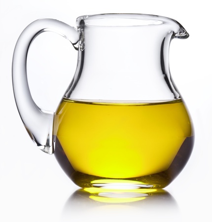 Small jug with olive oil. Isolated on a white background.の写真素材