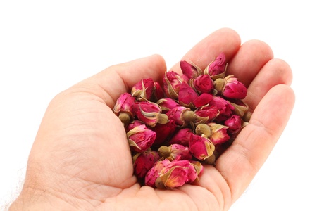 Heap of tea roses in manの写真素材