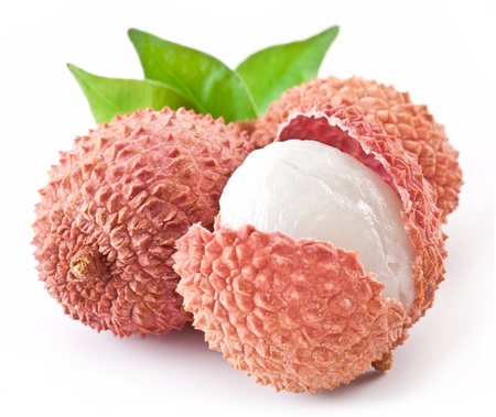 Lychee with leaves on a white background の写真素材