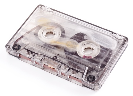 Old broken cassette isolated on white の写真素材