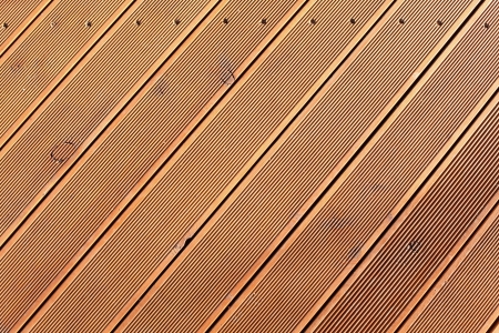 Wooden background with diagonal boards.の写真素材
