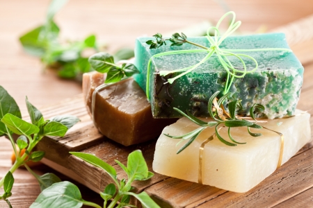 Pieces of natural soap with herbs.の写真素材