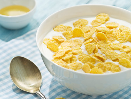 Cornflakes cereal and milk. Morning breakfast.