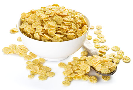 Cornflakes in the white bowl. Morning breakfast.
