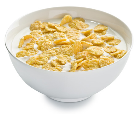 Cornflakes in the bowl on white background. File contains clipping paths.の写真素材