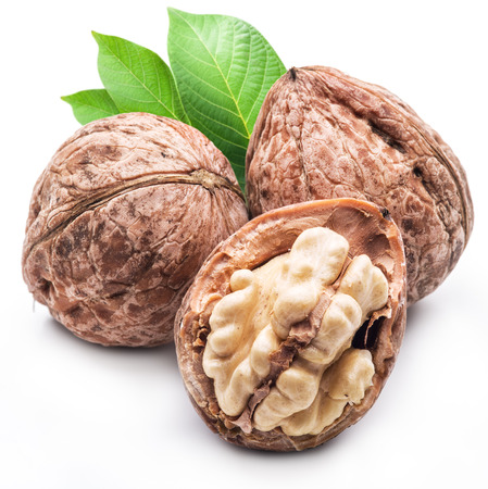 Walnut and walnut kernel isolated on the white background.の写真素材