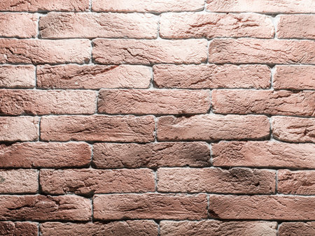 Red brick wall. Close-up picture of bricks.