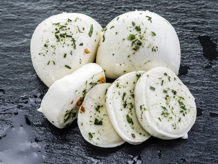 Mozzarella and tomatoes. Dark grey background.の写真素材