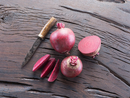 Red beet or beetroot on the wooden table.