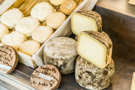 Different cheeses at open air-market.の写真素材