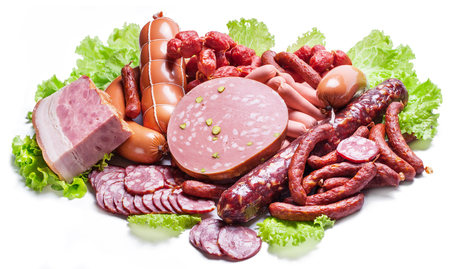 Variety of dry cured sausage products and meat.の写真素材
