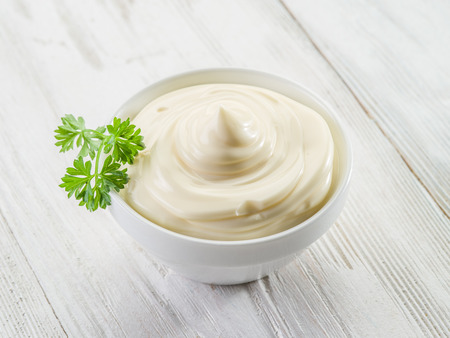 Natural mayonnaise ingredients and the sauce itself.の写真素材
