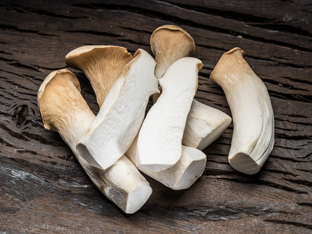 King oyster mushrooms on the wooden background.の写真素材
