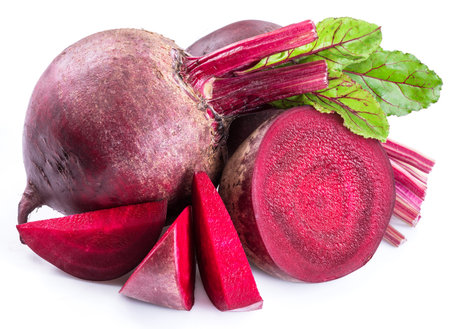 Red beet or beetroot with slices on white background.