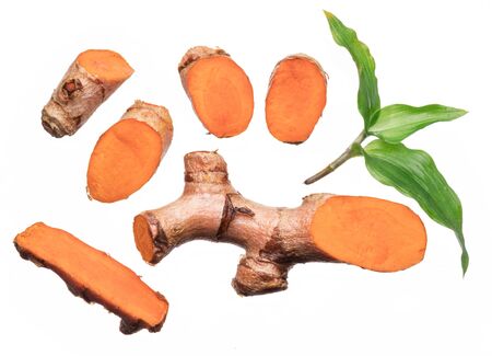 Collection of fresh turmeric cuts isolated on white background.の写真素材