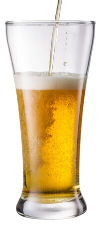 Beer glass isolated on a white background.  Light beer. Pouring process.の写真素材