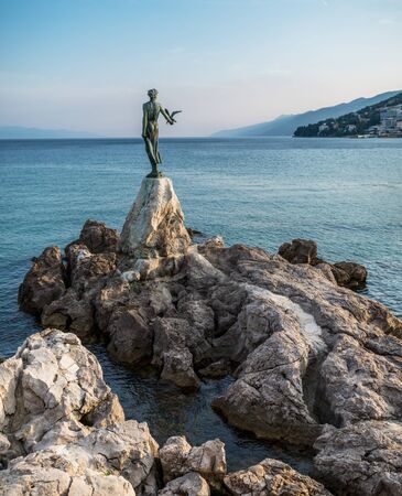 The Maiden with the Seagull. The statue is the symbol of  Opatij, Croatia.の写真素材