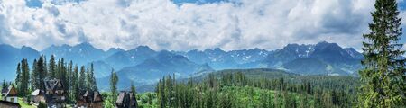 Landscape of High Tatras in the spring. Snowy mountain tops and beautiful sky.の写真素材