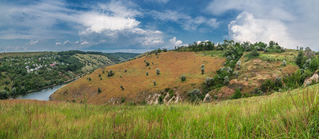 Beautiful nature landscape of central Ukraine. Travelling across Ukraine. Small village situated on...