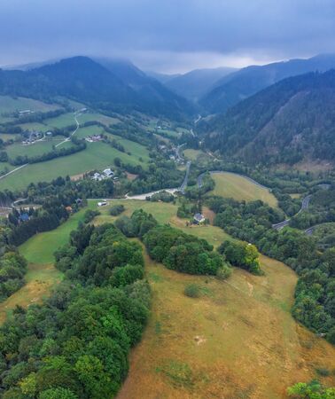 Beautiful panoramic view on hills and mountains near Annaberg town in the district  Lilienfeld, Lower Austria. Top view photo taken on drone.の写真素材