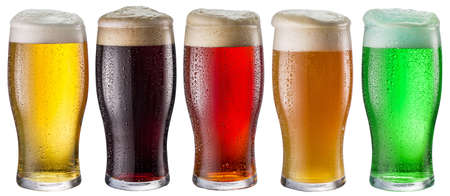 Collection of five types of different beer in glasses isolated on a white background. Each beer glass contains a clipping path.の写真素材
