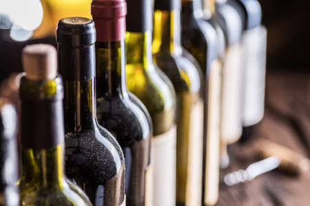 Line of wine bottles. Close-up.の写真素材