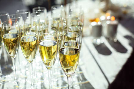 Glasses of sparkling wine close-up. Banquet service.の写真素材
