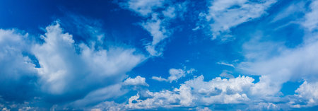 Beautiful cloud pattern in the blue sky. Panoramic view of skyscape.