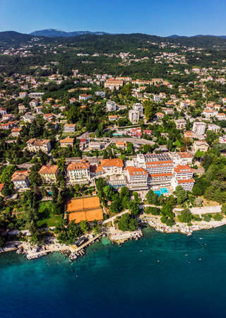 Beautiful panoramic view of Lovran village and its sea shore in Croatia. Top view photo taken on drone.の写真素材