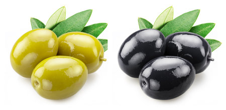 Whole green and black olives with olive leaves isolated on white background.の写真素材