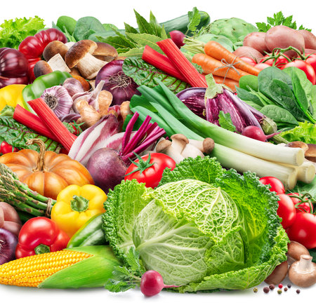 Plenty of fresh organic vegetables and herbs isolated on white background. Food background.の写真素材
