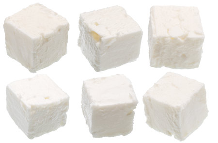 Collection of feta cheese cubes isolated on white. File contains clipping paths.の写真素材